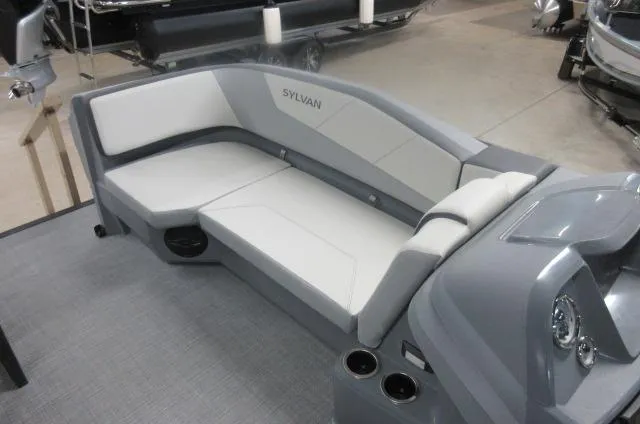 Slide: The Image of 2025 Sylvan A-20 LZ DH boat interior with gray seating and modern design. - 7