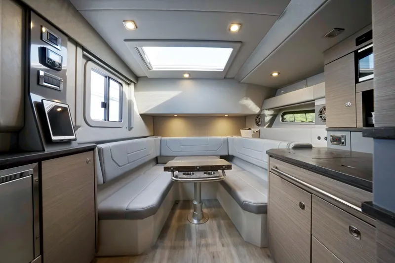 Slide: The Image of Interior of 2018 Formula 430 Super Sport Crossover with modern seating and skylight. - 13