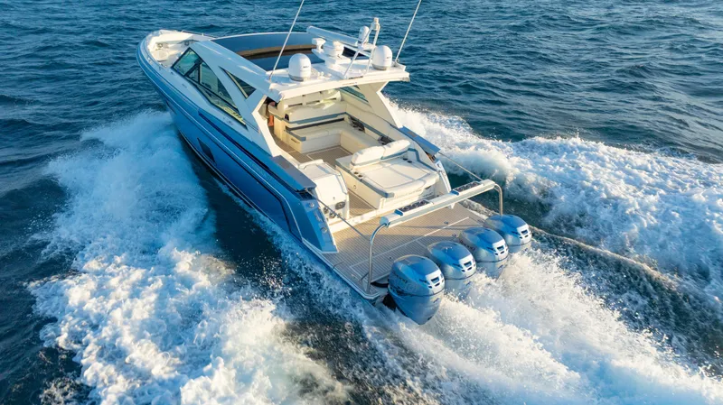 Slide: The Image of 2018 Formula 430 Super Sport Crossover cruising on open water, showcasing powerful engines. - 35