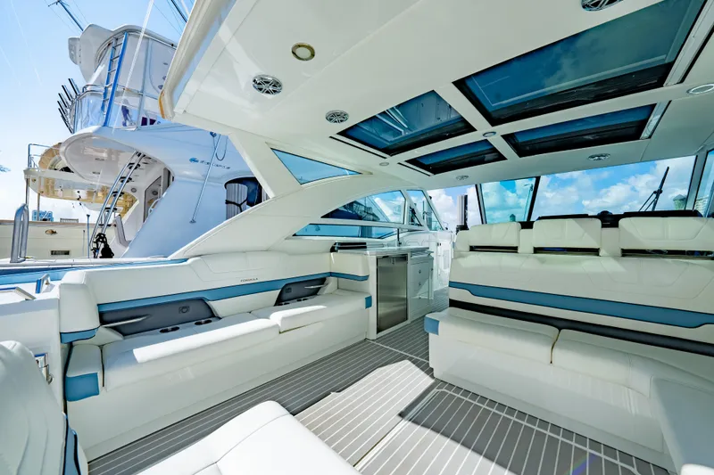 Slide: The Image of 2018 Formula 430 Super Sport Crossover interior with luxurious seating and modern design. - 4