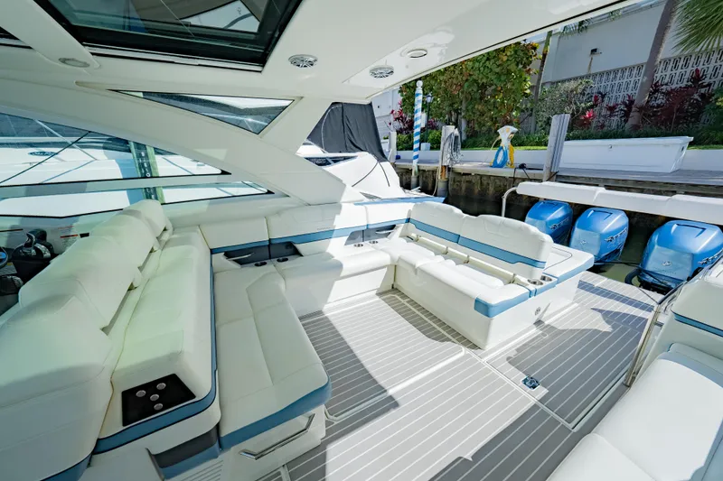 Slide: The Image of 2018 Formula 430 Super Sport Crossover yacht interior with luxurious seating and modern design. - 6