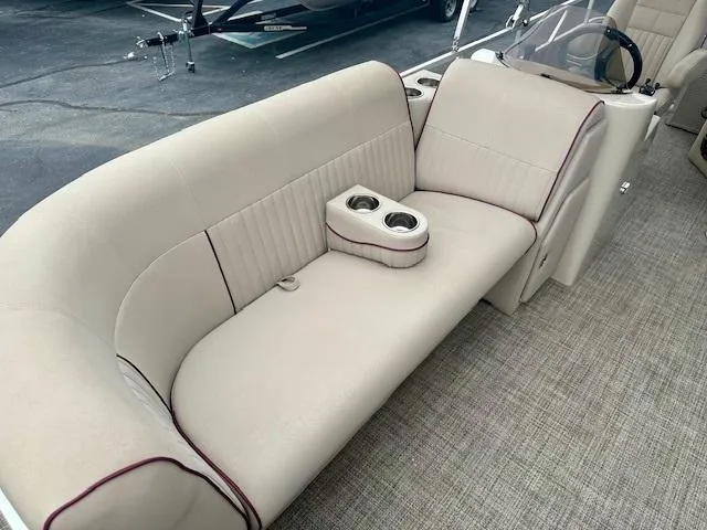 Slide: The Image of Luxurious seating on 2019 Qwest 818 boat with cup holders and plush upholstery. - 8