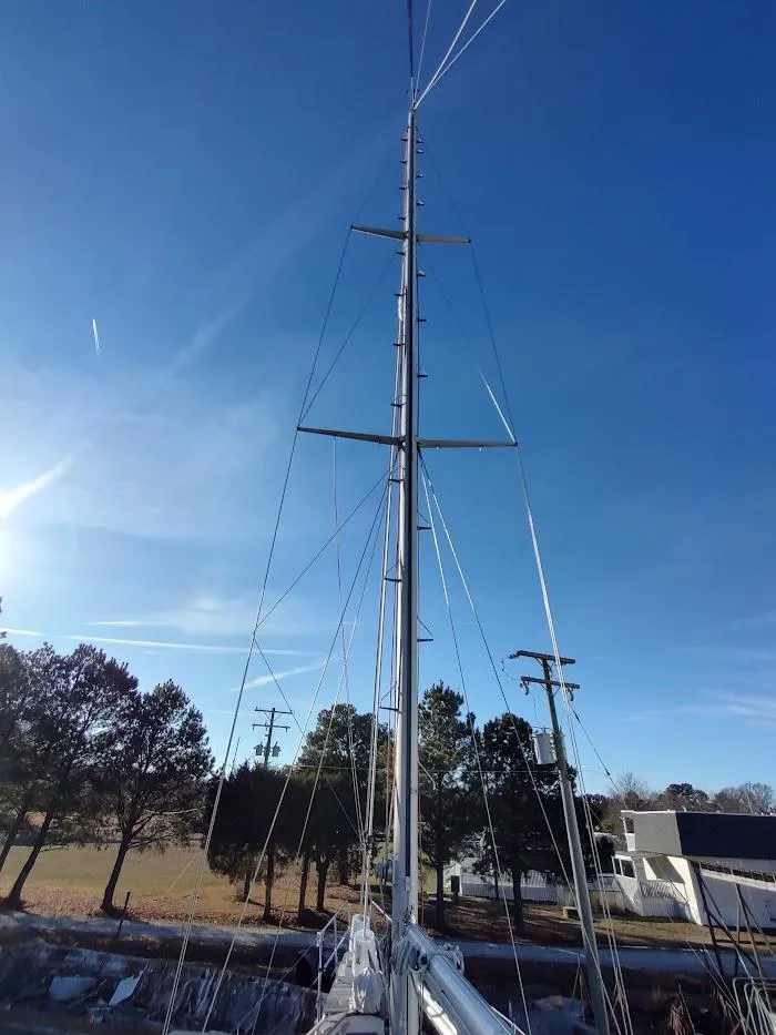 Slide: The Image of Mast of 1977 Hallberg-Rassy 41 sailboat against clear blue sky. - 16