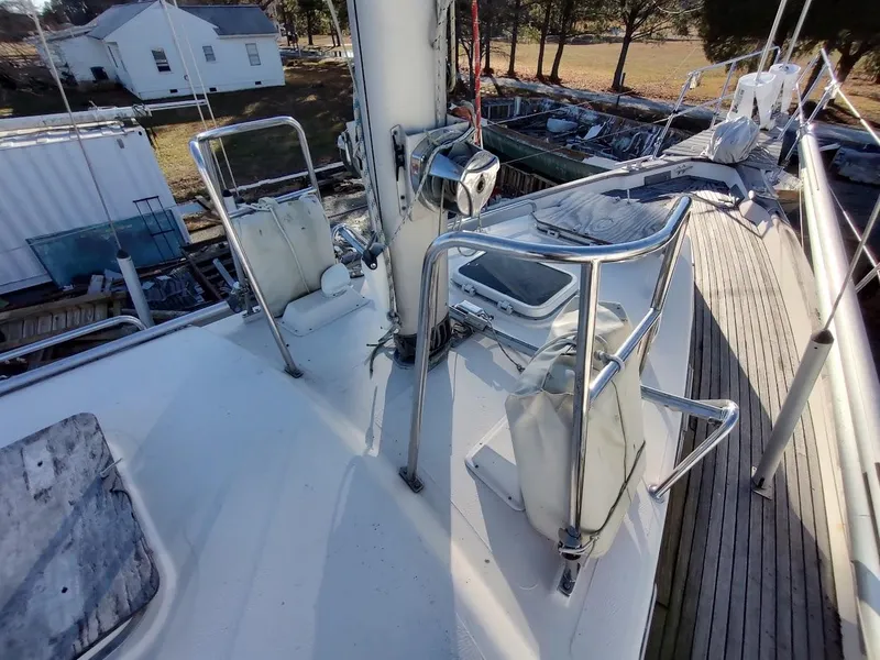 Slide: The Image of 1977 Hallberg-Rassy 41 sailboat deck with stainless steel railings and equipment. - 39