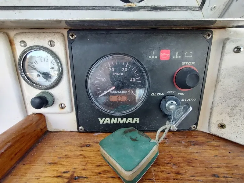 Slide: The Image of Yanmar engine control panel on a 1977 Hallberg-Rassy 41 sailboat. - 43