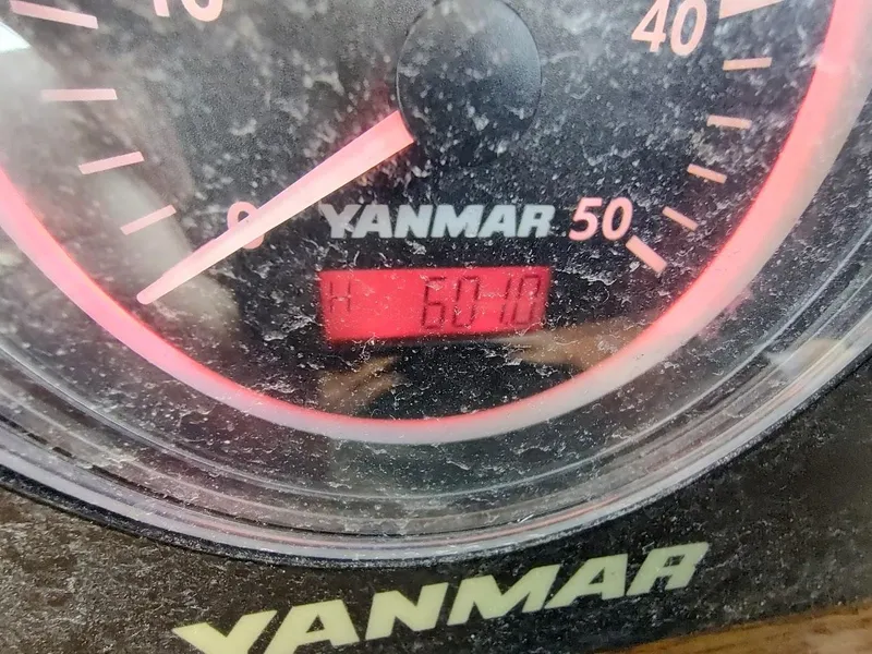Slide: The Image of Close-up of a Yanmar engine gauge on a 1977 Hallberg-Rassy 41 sailboat. - 44
