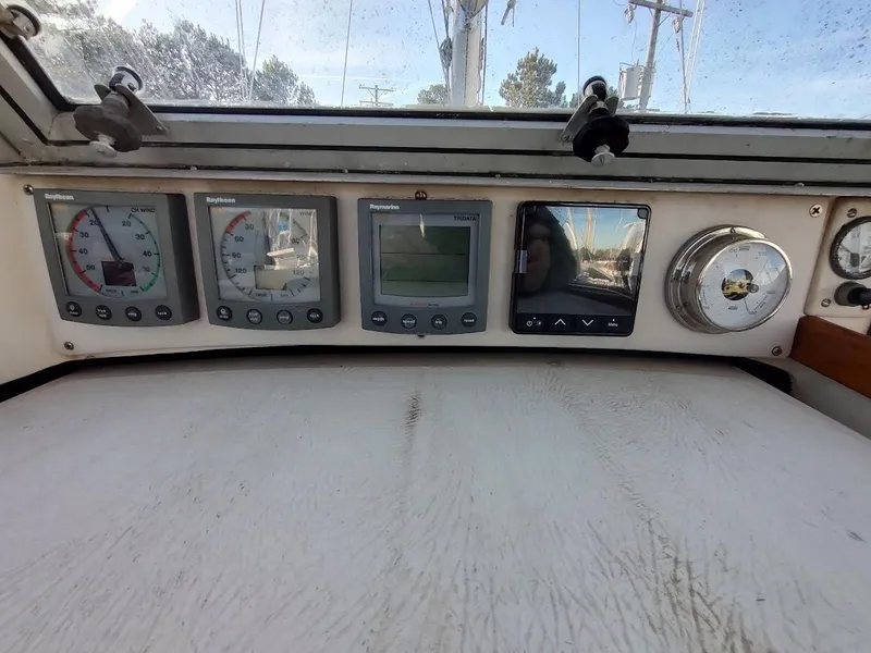 Slide: The Image of Control panel of a 1977 Hallberg-Rassy 41 sailboat with Raytheon instruments. - 46