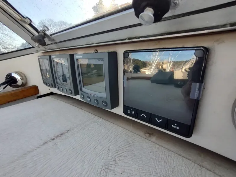 Slide: The Image of Control panel of a 1977 Hallberg-Rassy 41 sailboat with navigation instruments. - 47