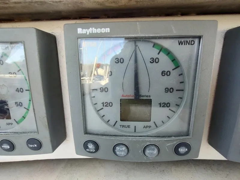 Slide: The Image of Wind gauge on 1977 Hallberg-Rassy 41 yacht, displaying wind direction and speed. - 49