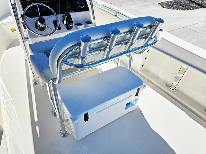 Slide: The Image of 2025 Bulls Bay 230 CC boat interior with rod holders and cooler. - 12