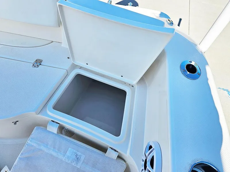 Slide: The Image of Open storage compartment on 2025 Bulls Bay 230 CC boat deck. - 13