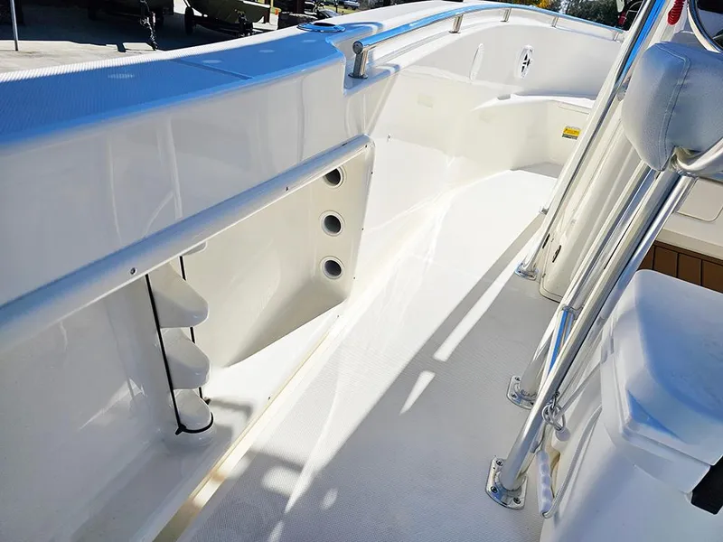 Slide: The Image of 2025 Bulls Bay 230 CC boat interior with sleek white design and modern features. - 16
