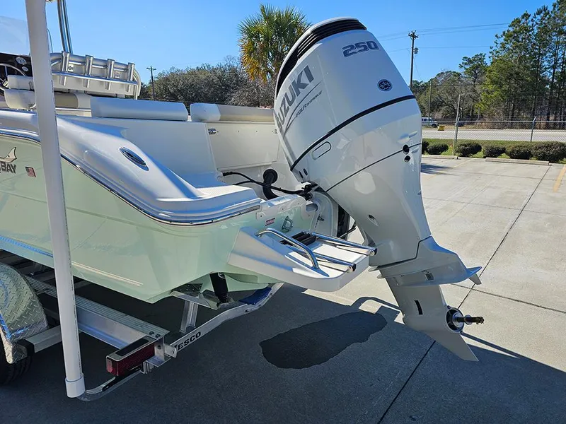 Slide: The Image of 2025 Bulls Bay 230 CC boat with Suzuki 250 outboard motor on a trailer. - 9