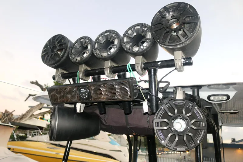 Slide: The Image of Audio system on a 2022 Sea Hunt Ultra 305 SE boat, featuring multiple speakers. - 10