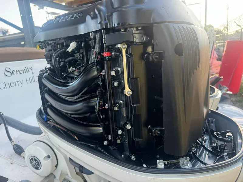 Slide: The Image of 2022 Sea Hunt Ultra 305 SE boat engine, detailed view of components and mechanics. - 21