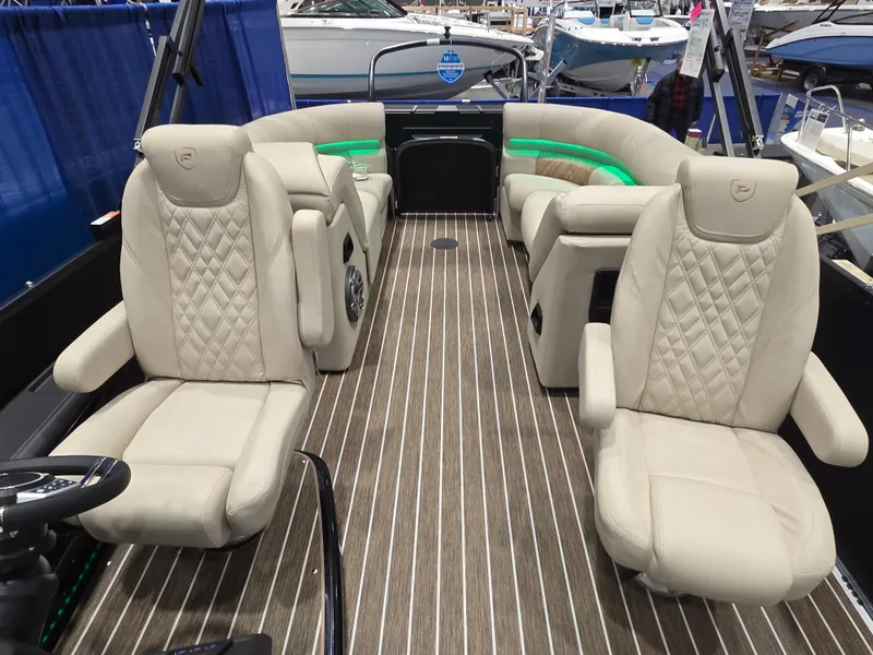 Slide: The Image of Luxurious 2025 Premier Intrigue boat interior with plush seating and elegant design. - 24