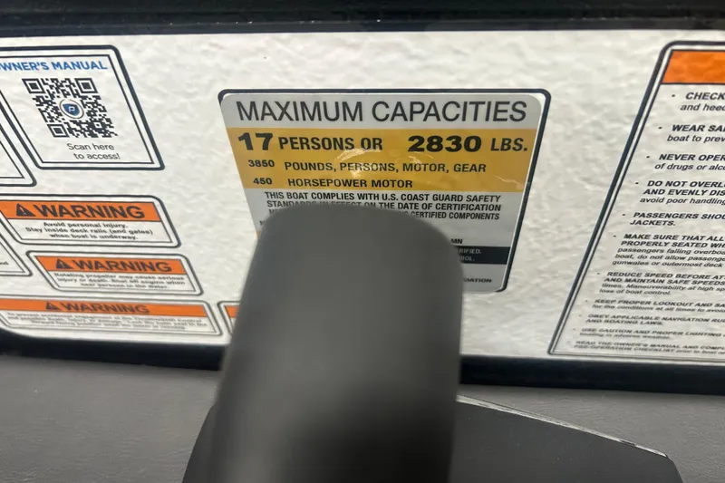 Slide: The Image of 2025 Premier 250 Intrigue RF capacity label, 17 persons or 2830 lbs, 450 horsepower. - 28