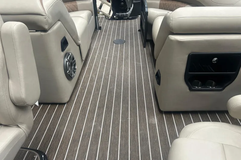 Slide: The Image of Luxurious interior of 2025 Premier 250 Intrigue RF boat with plush seating and striped flooring. - 36