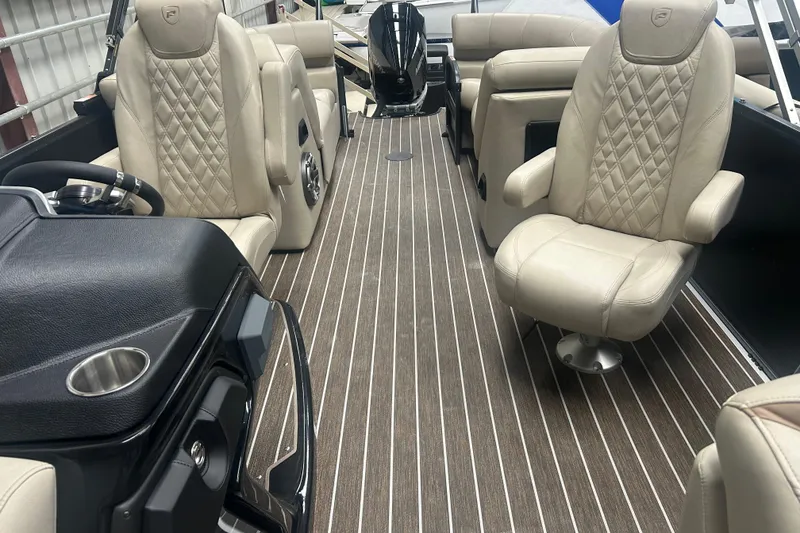 Slide: The Image of Luxurious interior of 2025 Premier 250 Intrigue RF boat with plush seating and sleek design. - 38