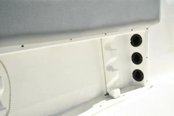 Slide: The Image of 2022 NauticStar 2302 Legacy boat interior detail with rod holders. - 16