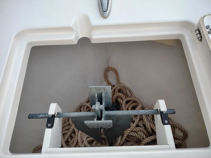 Slide: The Image of Anchor storage compartment on a 2020 Cobia 240 Center Console boat. - 20