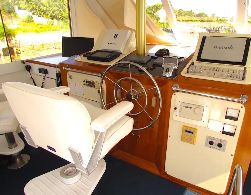 Slide: The Image of Interior helm of 1972 Hargrave 67 Motor Yacht with modern navigation equipment. - 17