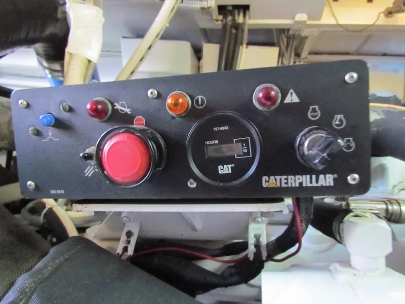 Slide: The Image of Control panel of a Caterpillar engine on a 1972 Hargrave 67 Motor Yacht. - 40