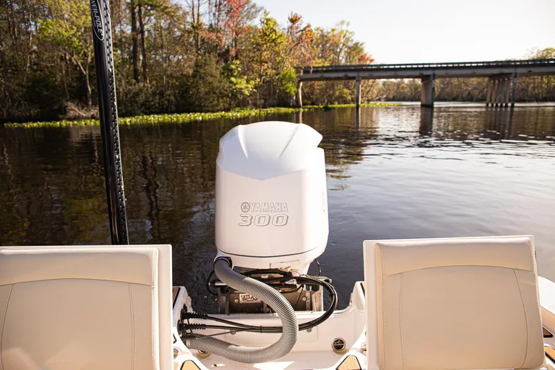 Slide: The Image of 2017 Everglades 253 Center Console boat with Yamaha 300 engine on a serene river. - 27