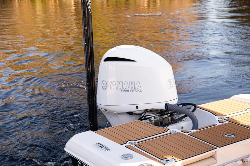 Slide: The Image of 2017 Everglades 253 Center Console with Yamaha outboard engine on water. - 35