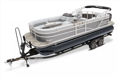 Slide: The Image of 2024 Ranger 223C pontoon boat on trailer, featuring sleek design and spacious seating. - 11