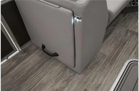 Slide: The Image of 2024 Ranger 223C interior with sleek gray seating and modern flooring. - 13