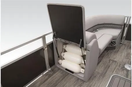 Slide: The Image of 2024 Ranger 223C boat interior with open storage compartment and seating. - 7