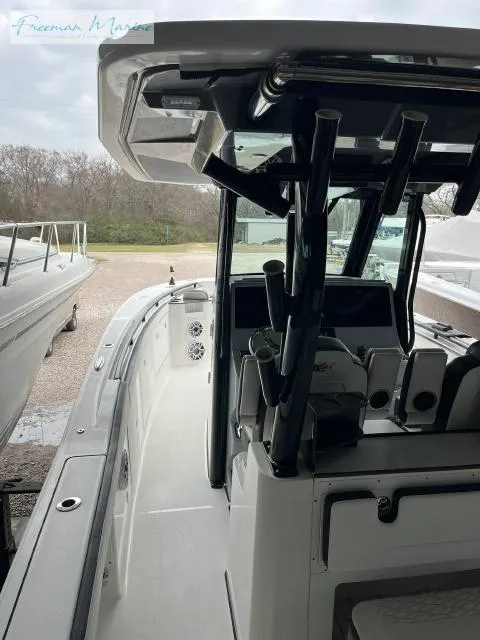 Slide: The Image of 2022 Crevalle 33 CSF boat interior with modern console and seating. - 12