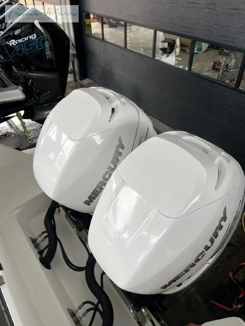 Slide: The Image of 2022 Crevalle 33 CSF boat with twin Mercury outboard engines. - 15