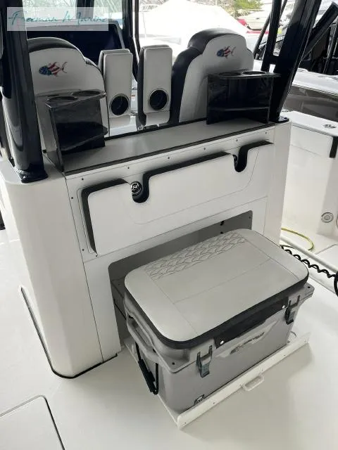 Slide: The Image of 2022 Crevalle 33 CSF boat interior with seating and storage area. - 8