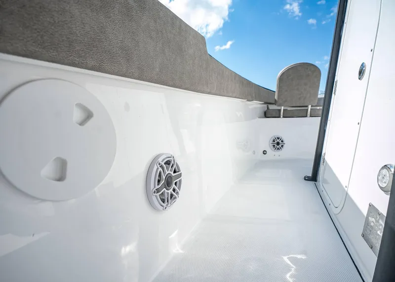Slide: The Image of 2025 Sea Hunt Ultra 275 SE boat interior with speakers and seating. - 32