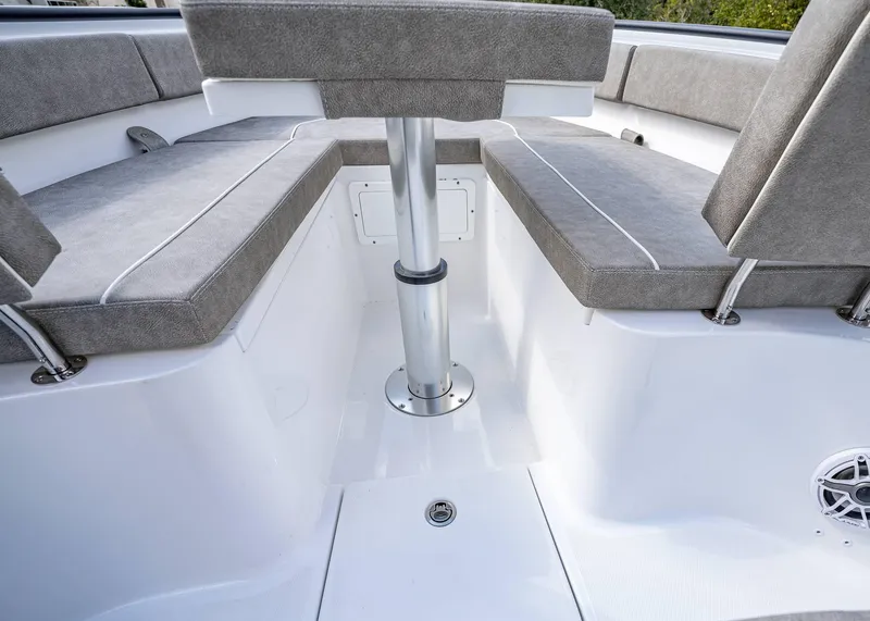 Slide: The Image of 2025 Sea Hunt Ultra 275 SE boat interior with cushioned seating and sleek design. - 36