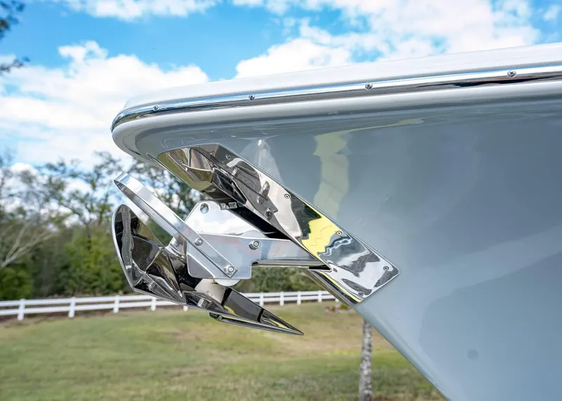 Slide: The Image of Close-up of 2025 Sea Hunt Ultra 275 SE boat anchor against a scenic background. - 44
