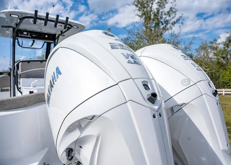 Slide: The Image of 2025 Sea Hunt Ultra 275 SE with twin Yamaha outboard engines, showcasing power and design. - 6