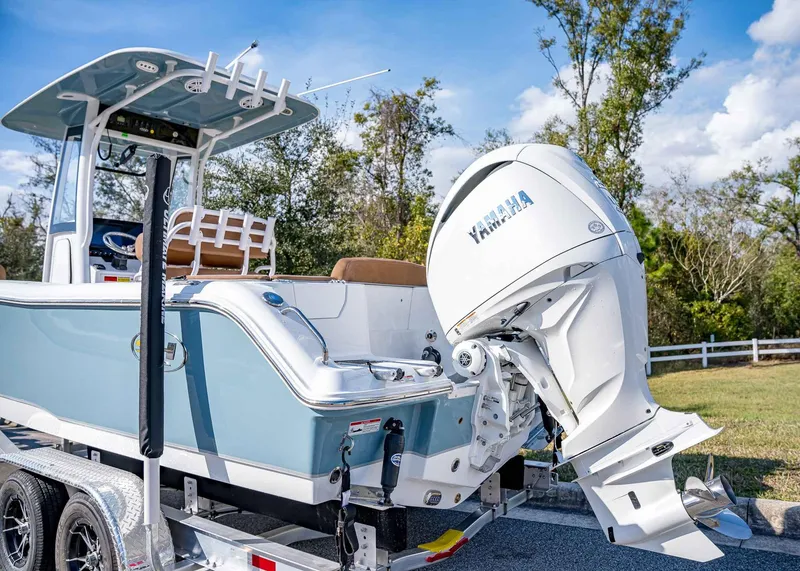 Slide: The Image of 2025 Sea Hunt Ultra 235 SE boat with Yamaha engine on trailer. - 4