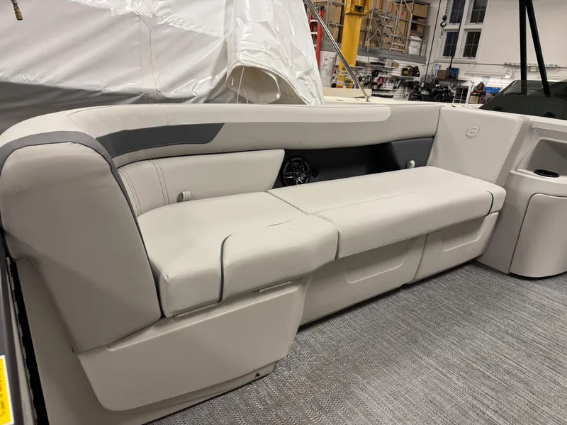 Slide: The Image of 2025 Godfrey Sweetwater Entertainment boat interior with plush seating and modern design. - 10