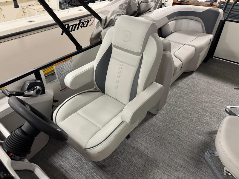 Slide: The Image of 2025 Godfrey Sweetwater Entertainment boat interior with plush seating and modern design. - 15