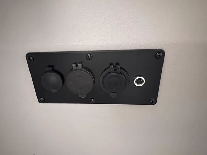 Slide: The Image of Power outlet panel on 2025 Godfrey Sweetwater Entertainment boat. - 21