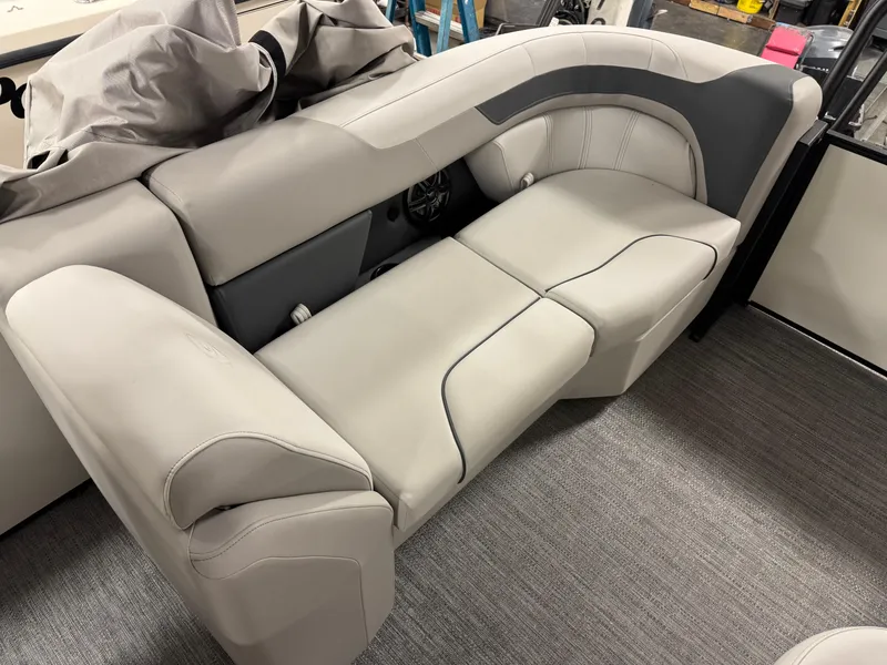 Slide: The Image of Luxurious seating on 2025 Godfrey Sweetwater Entertainment boat, featuring plush gray upholstery. - 23