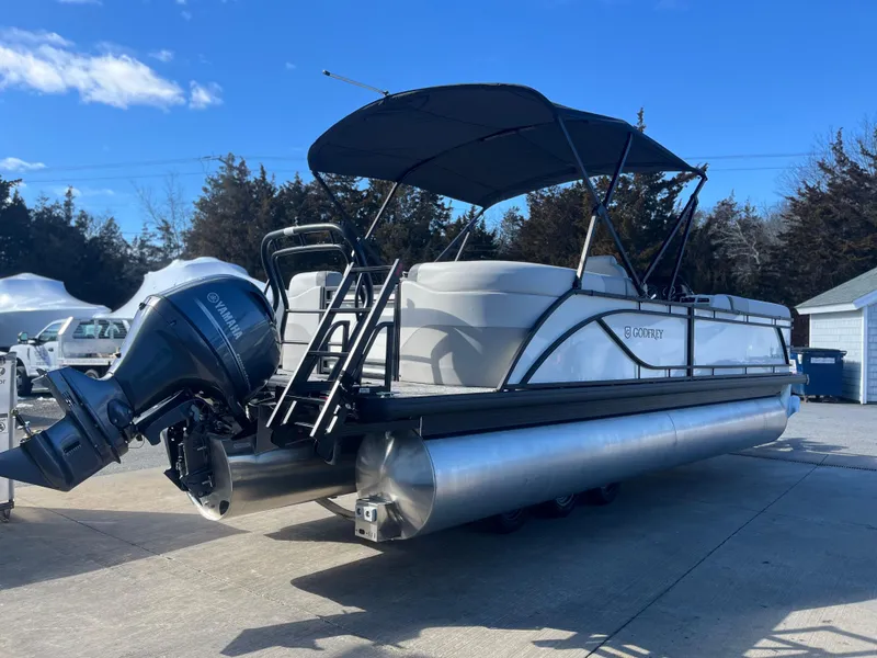 Slide: The Image of 2025 Godfrey Sweetwater Entertainment pontoon boat with canopy and outboard motor. - 3
