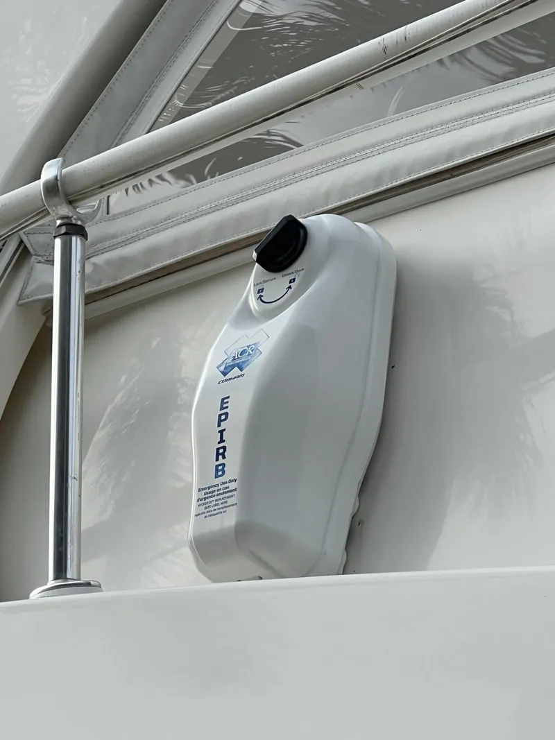 Slide: The Image of EPIRB device mounted on a 2008 Ovation 52 yacht for emergency signaling. - 23