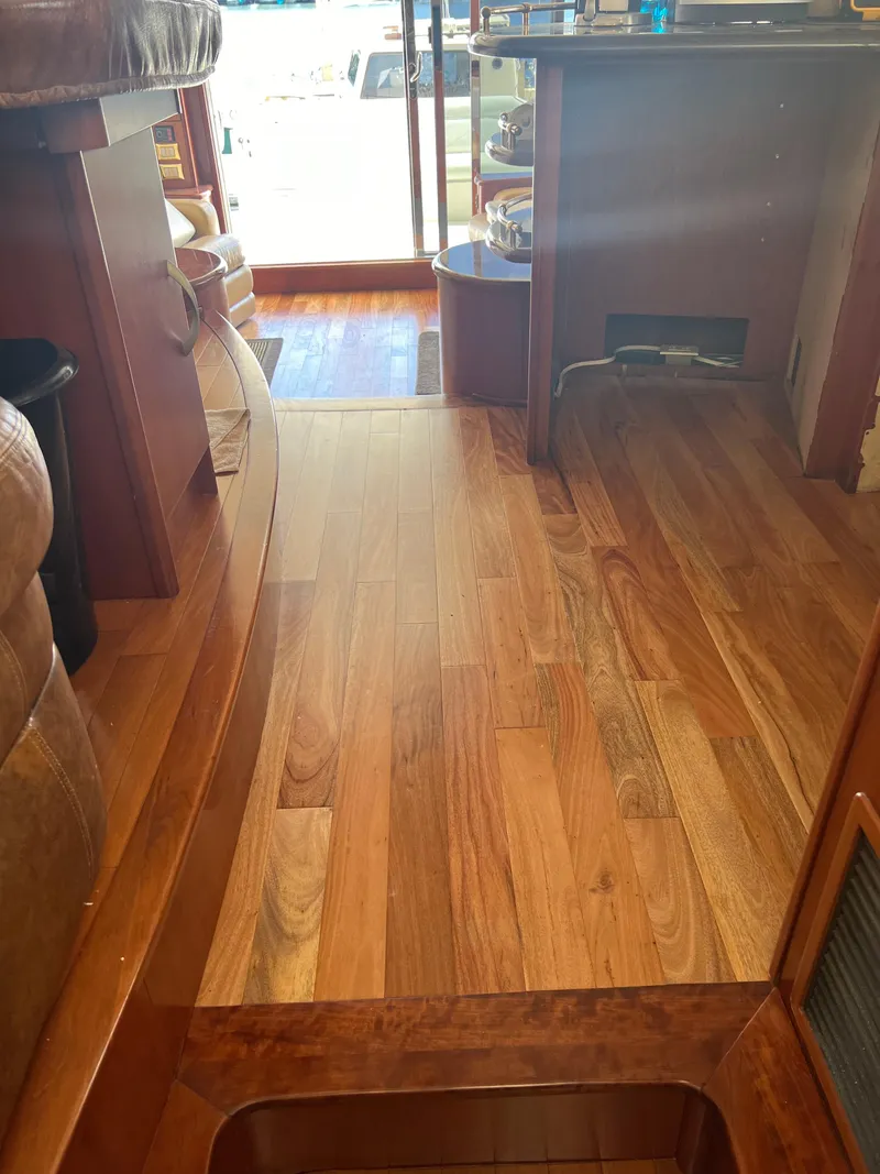 Slide: The Image of Interior of a 2008 Ovation 52 yacht with polished wooden flooring. - 29