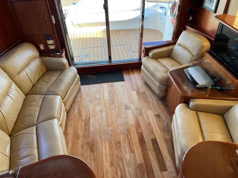 Slide: The Image of Luxurious 2008 Ovation 52 yacht interior with leather seating and wooden flooring. - 31