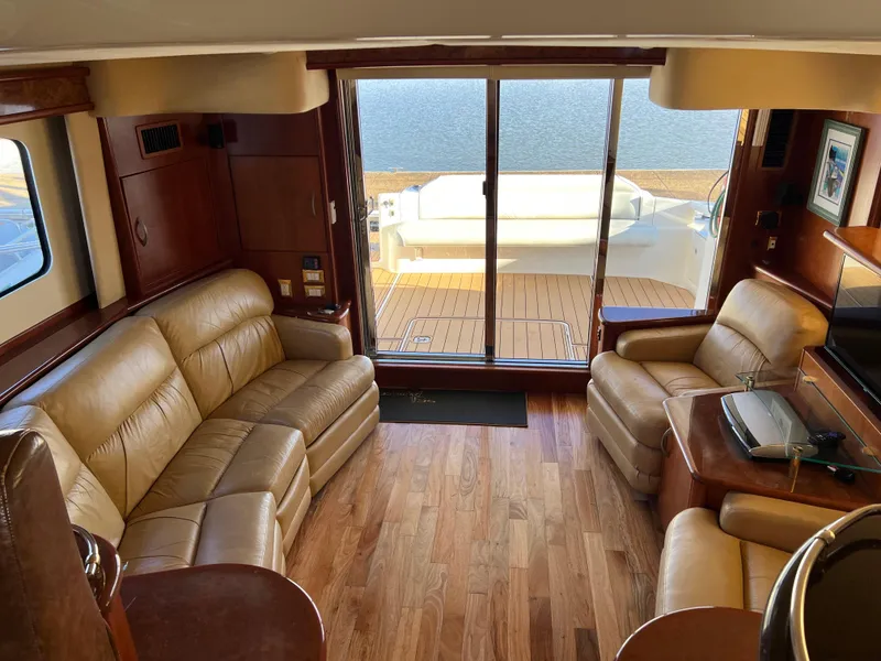 Slide: The Image of Luxurious interior of 2008 Ovation 52 yacht with leather seating and wooden flooring. - 32