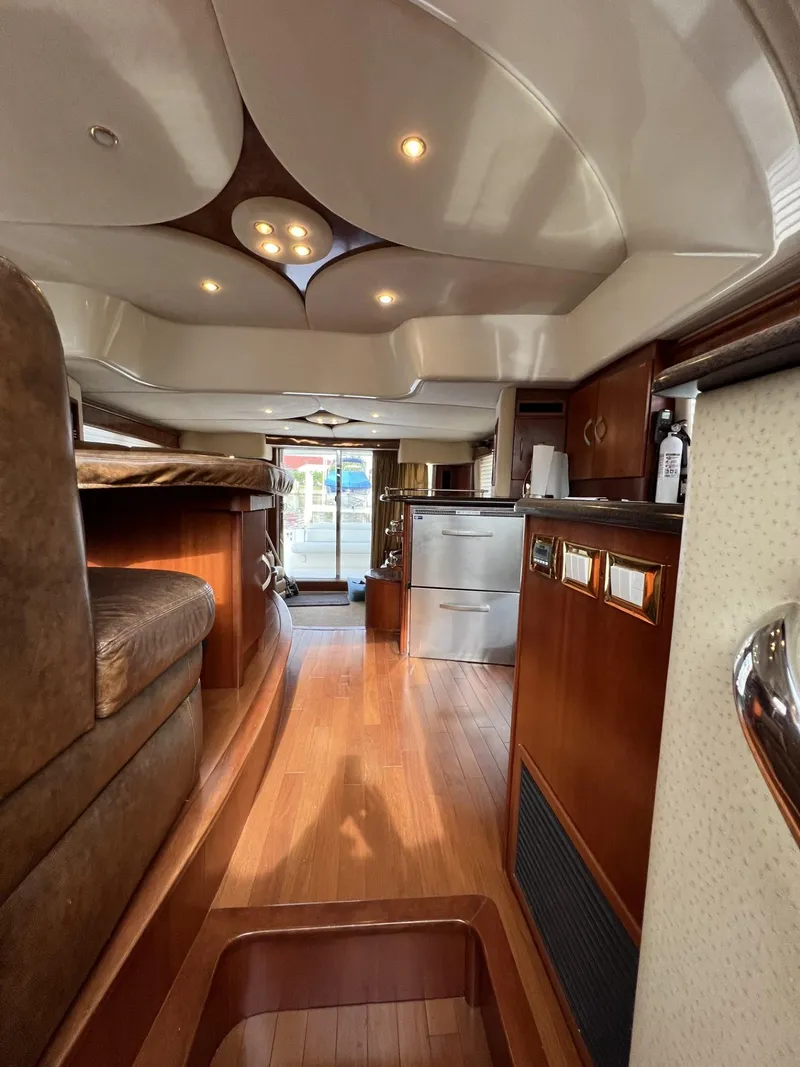Slide: The Image of Luxurious interior of a 2008 Ovation 52 yacht with elegant wood finishes. - 35
